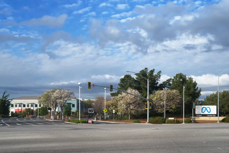 Roadway and Meta sign at the company’s Menlo Park headquarters.